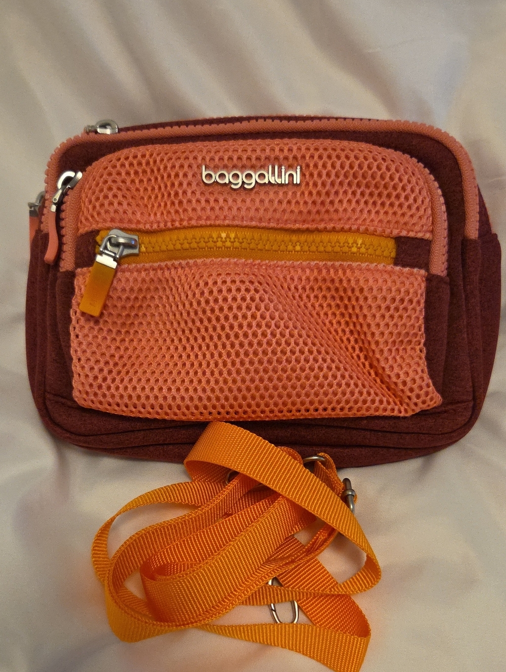 Baggallini Coral Mesh Crossbody with Maroon Base and Orange Strap